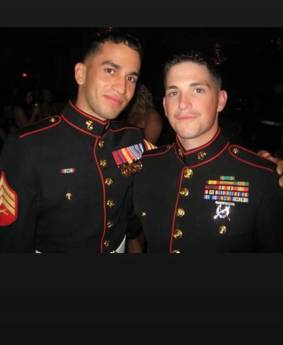 Justin Cox with a fellow Marine in dress blue uniforms